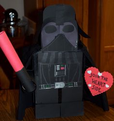 a darth vader paper craft with a heart on it