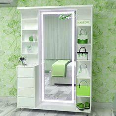 a bedroom with green and white accessories on the shelves, including a large mirror in the corner