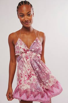 A stunning summer staple, this mini slip from Intimately is featured in a printed silky fabrication with cutout details and a handkerchief hem. **Fit:** A-line, mini length **Features:** Silky fabrication, triangle cups, ruched underband, side cutouts, adjustable skinny straps and halter straps, shirred back, cutout detail, floral print, handkerchief hem **Why We | Oasis Mini Slip by Intimately at Free People in Pink, Size: L Fits For Greece, European Going Out Outfit, Casual Summer Mini Dress, Italy Fits Summer, Spring Beach Mini Slip Dress, Spring Break Fits, Italian Summer Fashion, Urban Outfitters Summer Beach Mini Dress, Punta Cana Outfits