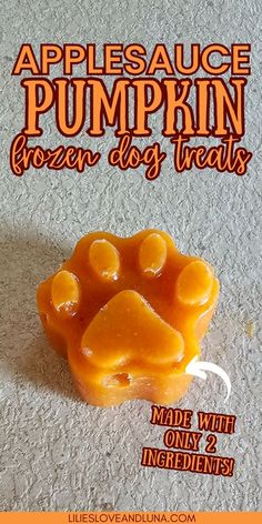 Bone shaped frozen dog treats with a text overlay that reads applesauce pumpkin frozen dog treats made with only 2 ingredients. Pumpkin Dog Treats Without Peanut Butter, Dog Treats Made With Pumpkin Puree, Applesauce For Dogs, Dog Safe Treats, Homemade Puppy Teething Treats, Pb Dog Treats Homemade, Woof Pupsicle Recipes Pumpkin, Canned Pumpkin Dog Treats, No Peanut Butter Dog Treats