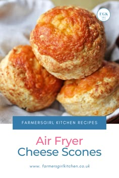 four cheese scones in a basket with text overlay reading farmer's kitchen recipes air - fryer cheese scones