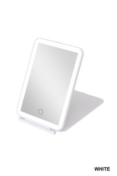 an electronic device with a mirror on top of it