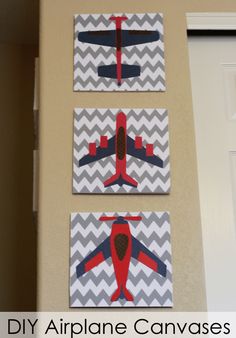 three canvases with airplanes on them are hanging on the wall next to a door