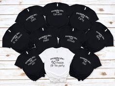 black and white t - shirts with the names of each family on them, arranged in a circle