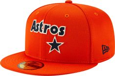 an orange hat with the word astros on it