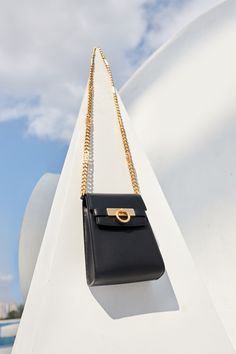 The Unlocked Vertical Bag has all the elegance expected from Parisa Wang, but in a minimal, rectangular form. Its embellished PW logo chain strap and signature lock enhance both its edgy feel and practicality. - USA full-grain smooth calfskin leather exterior - Smooth leather interior - One internal slip pocket - Embellished PW logo chain strap - Height: 7" - Length 5.5" - Depth: 2.5" - Weight: 1 lb - Cross-body bag Parisa Wang, Unlocked Phones, Chloe Drew, Purses Designer, Phone Bag, Leather Interior, Chain Strap, Smooth Leather, Bucket Bag