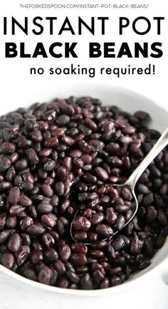 instant pot black beans in a white bowl with a spoon and text overlay that reads instant pot black beans no soaking required