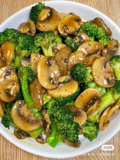 broccoli and mushrooms are in a white bowl