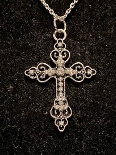 Necklace is silver in color Pendant measure 2 inches in length and 1 inch in width Pendant is made with rhinestones Mushroom Jewelry, Edgy Jewelry, Rhinestone Cross, Jewelry Accessories Ideas, Dope Jewelry, Funky Jewelry, Cross Jewelry, Cross Pendant Necklace, Silver Rhinestone