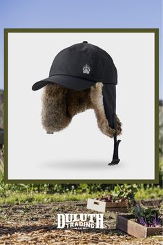 Colder than Siberia? Lower the rabbit fur flaps on the Alaskan Hardgear Ushanka Ball Cap to prevent frost-nipped ears in the wickedest winter weather. Adjustable Hats With Faux Fur Trim For Cold Weather, Outdoor Beanie With Faux Fur Lining, Adjustable Faux Fur Trim Hats For Cold Weather, Adjustable Faux Fur Trim Cold Weather Hats, Winter Hunting Cap, Windproof Hats With Ear Flaps For Cold Weather, Windproof Cold Weather Hats With Ear Flaps, Brimmed Winter Hunting Hat, Windproof Outdoor Hat With Ear Flaps