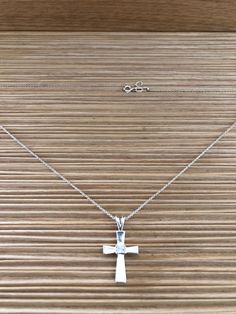 "cross pendant that never goes out of style! *Sterling Silver  *3.4 grams *18\" long *FREE Domestic Shipping!" Classic Cross Necklace, Sterling Silver Cross Pendant Necklace For Anniversary, Silver Stamped 925 Cross Necklace For Gift, Stamped 925 Cross Necklace For Gift, Hallmarked Sterling Silver Cross Necklace, Silver Tarnish-resistant Cross Pendant Jewelry, Nickel-free Cross Pendant Necklace As Gift, Antique Silver Nickel-free Cross Pendant Necklace, Nickel-free Sterling Silver Cross Necklace For Gift