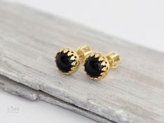 Gold stud earrings with natural black onyx. Made of 585/14k solid gold (rose, yellow or white - your choice). Stud size is 7 mm. Luxury Black Gemstone Earrings, Black Pierced Earrings In Fine Jewelry Style, Black Pierced Earrings Fine Jewelry, Black Polished Finish Fine Jewelry Earrings, Luxury Black Round Earrings, Luxury Black Jewelry, Black Gemstone Earrings For Anniversary, Black Fine Jewelry Earrings, Black Sterling Silver Fine Jewelry Earrings