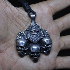 Handmade Rock n roll jewelry like you've never seen before. Grab yours NOW or cry later. Best attention to detail. Article name : PYRAMID SKULLS PENDANT Environmentally friendly metal made with passion and great attention to detail 🔨 Very comfortable to wear daily and in any occasion 🖤💍 Shipped from Jakarta, Indonesia Standard shipping use USPS ( US Customers ) Singapore post ( Rest of the world ) Express shipping use DHL Express Note : Please put a phone number in a note for DHL Express, it Collectible Silver Skull Necklace, Collectible Silver Skull Jewelry, Nickel Free Gothic Necklaces For Collectors, Nickel-free Gothic Necklaces For Collectors, Gothic Nickel-free Necklaces, Symbolic Skull Jewelry With Oxidized Finish, Gothic Hand Cast Collectible Necklaces, Oxidized Finish Skull Jewelry For Gifts, Skull Shaped Oxidized Jewelry As Gift