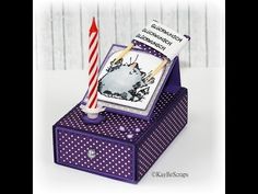 a purple box with a toothbrush and some candy in it