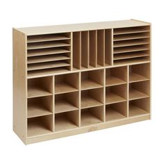 a large wooden shelf with many compartments