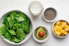 three bowls filled with different types of food next to each other on top of a white table