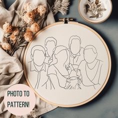 a cross stitch pattern with the words photo to pattern on it next to some dried flowers