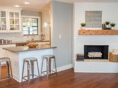 the kitchen is clean and ready to be used as a living room or dining area