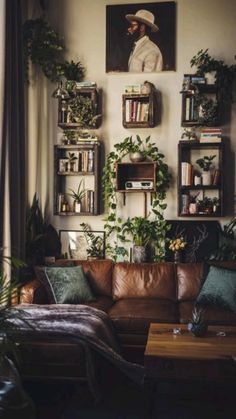 a living room filled with furniture and lots of plants