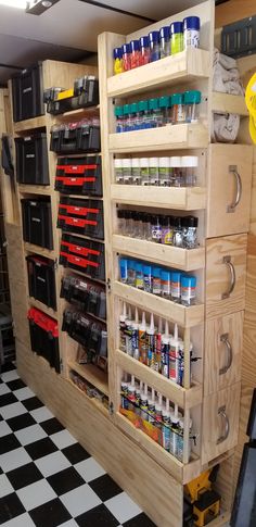 a large wooden shelf filled with lots of items