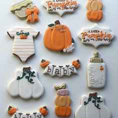 decorated cookies with baby names and pumpkins on them