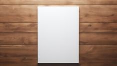 an empty white sheet of paper hanging on a wooden wall