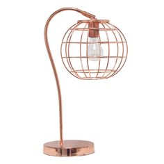 a copper metal lamp with a light bulb on it