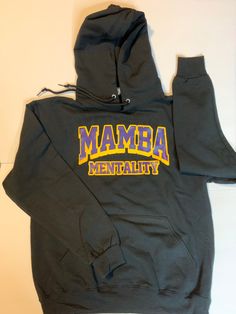 A hoodie to honor the LEGACY of one of the Greatest Lakers of All Time...Kobe Bryant’s “MAMBA MENTALITY” extended far beyond the basketball court. Salute the man and his Legacy...#RIPKobe Gray Fan Apparel Sweatshirt For Streetwear, Streetwear Team Spirit Hoodie With Drawstring, Team Spirit Sweatshirt With Drawstring Hood For Streetwear, Team Spirit Sweatshirt With Drawstring Hood, Streetwear Hoodie Sweatshirt With Team Name, Mamba Mentality, Kobe Bryant, Black Hoodie, All Time