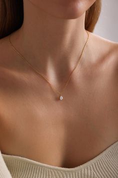 TEARDROP  DIAMOND  NECKLACE Elegant and timeless, our Teardrop  Necklace exudes grace and sophistication. Crafted to perfection, this minimalist jewelry piece is the ideal gift for her, whether it's for Mom, a birthday, or a special occasion like Mother's Day. With its delicate charm resembling a water drop, it adds a touch of subtle beauty to any outfit. Versatile and refined, this necklace transitions effortlessly from everyday wear to bridal elegance. Elevate your style with our Teardrop Neck Pear Diamond Necklace, Teardrop Diamond Necklace, Water Drop Necklace, Baguette Necklace, Teardrop Diamond, Subtle Beauty, Necklace Mom, Bridal Elegance, Necklace Elegant