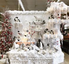 a christmas display in a store filled with lots of snow