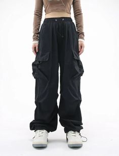 𝔇𝔢𝔱𝔞𝔦𝔩𝔰: Style: Techwear, Grunge, Streetwear Material: Polyester It features an oversized fit & comfy material. A perfect go-to for any t-shirt or tech-wear top. With the drawstring design, you can adjust the fit of pants to your preference - just like with everyday casual style. Enjoy free shipping with a purchase of over 80$ Model wears m with 5'5, 108 lb SIZE LENGTH WASIT HIPS 40 in 23 in 42 inM 40 in 24 in 43 inL 41 in 26 in 45 inXL 41 in 28 in 46 in2XL 41 in 29 in 48 inItem measured Black Baggy Techwear Parachute Pants, Casual Black Cargo Style Parachute Pants, Casual Black Cargo Parachute Pants, Oversized Urban Black Bottoms, Baggy Black Cargo Pants For Sports, Casual Black Wide Leg Parachute Pants, Black Casual Cargo Pants For Streetwear, Casual Black Bottoms With Drawstring, Black Trendy Relaxed Fit Cargo Pants