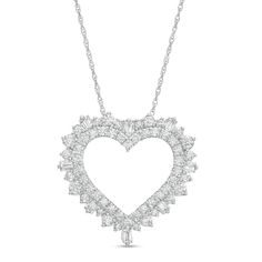 Give her a dazzling symbol of your love with this diamond heart pendant. Crafted in cool 10K white gold, this design showcases an open diamond-lined heart. The shadow border sparkles with alternating baguette-cut and round diamonds. Radiant with 1 ct. t.w. of diamonds and a bright polished shine, this pendant suspends along an 18.0-inch rope chain that secures with a spring-ring clasp. White Diamond Open Heart Necklace, Anniversary Heart Cut Baguette Diamond Jewelry, Heart Cut Baguette Diamond Jewelry For Anniversary, White Diamond Open Heart Necklace For Anniversary, Heart Shaped Baguette Diamond Jewelry For Anniversary, White Open Heart Diamond Necklace For Anniversary, Heart-shaped Baguette Diamond Jewelry For Anniversary, Brilliant Cut White Diamond Open Heart Necklace, Shadow Heart