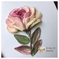 two pink and white flowers with green leaves on a white surface, next to the caption that reads 25 feb 19 jakarta