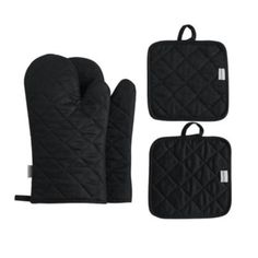 three oven mitts and one oven mitt with black quilting on the front