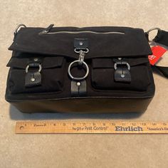 Nwt & Vintage Esprit “Heavy Metal” Black Shoulder Bag. Approximate Dimensions Are In The Photos. Two Velcro Closure Pockets On The Front Of The Bag. Main Closure Is A Huge Lobster Claw Clasp. Zippered Pockets Both Inside And Out. Very Long Canvas Adjustable Strap. (5295) Black Canvas Satchel With Zipper Closure, Black Satchel With Hardware Details, Black Canvas Crossbody Shoulder Bag, Black Rectangular Satchel With Metal Hardware, Black Travel Bag With Hardware Details, Black Canvas Satchel Shoulder Bag, Everyday Use Satchel Tote With Metal Hardware, Everyday Satchel Tote With Metal Hardware, Black Crossbody Canvas Bag With Zipper Closure