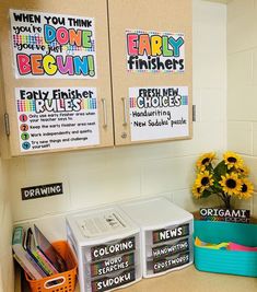 a kitchen counter topped with lots of clutter and magnets on the back of cabinets