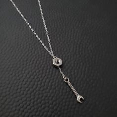 Perfect for turbo lovers, car enthusiasts & gear heads! Each comes with a nut and your choice of pendant and silver necklace. Dimensions & Materials:- Necklace: 18in, Sterling Silver- Hex Nut: Stainless Steel Bike Jewelry, Hex Nut, Gear Head, Lariat Necklace, Girls Jewelry, Art Clothes, Ring Bracelet, Heart Necklace, Jewelry Shop