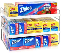 three tiered display rack holding several boxes of ziploc toothpaste