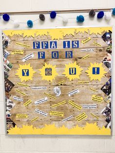 a bulletin board that has been decorated with pictures and words on it in blue and yellow