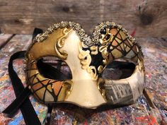 "Original Venetian Colombina mask for children very resistant, hand painted embellished with gold leaf, decoration with stucco and acrylic colors. -Material/Resin Made in Italy hypoallergenic and non-toxic. -Dimensions/13x6 Unisex -History of the mask/ \"Colombina\" is an ancient mask dating back to the 15th century. She represents a cunning and lying servant at the court of often very rich men such as the greedy and rich Venetian merchant \"Pantalone\" of Carlo Goldoni's commedia dell'arte. -Sh Venetian Masks For Mardi Gras Carnival, Multicolor Masquerade Mask For Carnival Festivals, Artistic Masquerade Mask For Mardi Gras Carnival, White Masquerade Mask For Carnival Festivals, Fantasy Masks For Carnival And Festivals, Fantasy Carnival Mask For Festivals, Traditional Masks And Prosthetics For Mardi Gras Carnival, Traditional Masks For Mardi Gras Carnival, Artistic Masks And Prosthetics For Mardi Gras Carnival