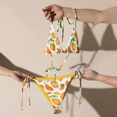 Make a splash all summer long with this one of a kind sustainable "Vintage Lemon" bikini set. Enjoy the smooth fabric and the flattering design, and show it off at the beach or by the pool! Removable pads and its double-layer make it comfy to wear all day by the pool or beach. It's made from soft recycled polyester with double-layering and UPF 50+. * Soft and stretchy material with UPF 50+ * Sizes up to 6XL * Bikini top comes with removable padding for comfort * Multiple ways to tie and style th Retro Bathing Suits, Summer Bikinis, Summer Fruit, Sustainable Fabrics, Upf 50, Women Swimsuits, Stretchy Material, Bathing Suit, String Bikinis