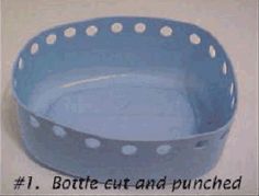 a blue bowl with white polka dots on the rim and bottom that says 1 bottle cut and punched