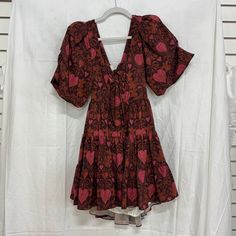 Eugenia Fernandez Floral Puff Sleeve Tie Back Babydoll Mini Dress Brown Size S Msrp: $265 Item Condition: Excellent Condition - No Flaws Measurements: Length: 33'' Sleeve Length: 11'' Pit To Pit: 15'' Waist: 11'' Brand: Eugenia Fernandez Size: S Color: Brown Puff Sleeve V-Neckline Floral Pattern Fully Lined Mini Length Tie Back Closure Poleyster Blend Hand Wash Adorned With A Delicate Floral Pattern, This Dress Adds A Touch Of Feminine Charm And Elegance To Your Wardrobe. Girly, Feminine, Modern, Classy, Classic, Timeless, Romantic, Fall, Party, Streetwear, Minimalist, Elegant, Sexy, Chic, Date Night, Night Out, Edgy, Dinner Date, Y2k, Cocktail, Sexy, Modest, Mature, Mini Dress, Puff S Fitted Vacation Dress With Balloon Sleeves, Fitted Balloon Sleeve Dress For Vacation, Pink Bohemian Puff Sleeve Dresses, Bohemian Puff Sleeve Dresses For Daywear, Bohemian Puff Sleeve Mini Dress For Brunch, Bohemian Flowy Mini Dress With Puff Sleeves, Y2k Cocktail, Streetwear Minimalist, Babydoll Mini Dress