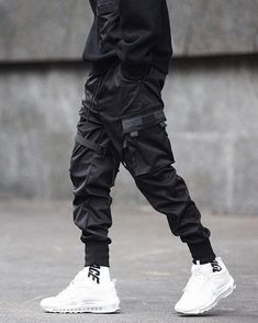 "Masaki" cargo pants - A techwear classic Size (cm) Waist Hips Length S 63-90 103 96.5 M 66-93 108 98 L 69-96 113 99.5 XL 72-99 118 101 XXL 76-103 123 103 XXXL 80-110 128 105 Choosing the "Masaki" Techwear cargo pants is a great idea for your wardrobe. Indeed, you like to fill your wardrobe with the best collections of pants? If so, then this is a model that deserves its place in your stuff. It is one of the most popular options on the market today. Now might be the time to take the opportunity Techwear Sweatpants With Hip Pockets, Techwear Sweatpants With Pockets, Techwear Sweatpants With Side Pockets For Outdoor, Techwear Sweatpants With Cargo Pockets, Winter Techwear Pants With Cargo Pockets, Utility Sweatpants With Cargo Pockets For Outdoor, Functional Streetwear Pants With Pockets, Urban Parachute Pants With Functional Pockets, Techwear Pants With Belt Loops For Outdoor