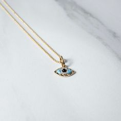 A charmed beauty - the Evil Eye has so many powerful meaning, especially our intricate charmed chain, a sure show stopper and a piece to last a lifetime. - Charm: 12mm Solid 14kt Gold Charm adorned with pave' diamond's, natural turquoise and obsidian stone. - Chain: 14/20 Gold Filled Talismans created to protect against the evil eye are also frequently called "evil eyes". 14k Gold Turquoise Fine Jewelry, Fine Jewelry In 14k Gold With Turquoise, Turquoise 14k Gold Fine Jewelry, Yellow Gold Round Pendant Jewelry With Diamond Eyes, Spiritual 14k Gold Gemstone Jewelry, Diamond Pendant With Diamond Eyes, Luxury Turquoise Jewelry With Diamond Accents, Spiritual Diamond Round Pendant Jewelry, Spiritual Diamond Jewelry With Gemstones