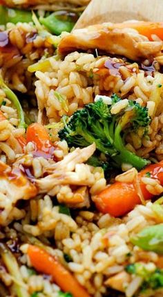 rice, broccoli and carrots are mixed together