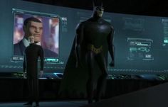 batman and robin wayne standing in front of large screens