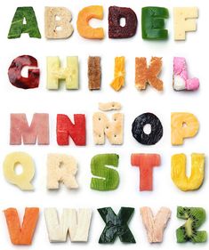 the letters are made up of fruits and veggies to spell out alphabets