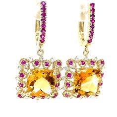 9.72 Carat Citrine Yellow Sapphire Diamond Yellow Gold Drop Earrings  These lovely earrings have 2 vibrant Cushion Cut Citrine Quartz that weigh 8.00 carats. They are surrounded by 32 Round Cut Diamonds that weigh 0.41 carats (Clarity: SI1, Color: F) and 40 Pink Sapphires that weigh 0.78 carats. The total carat weight of the earrings are 9.19 carats. The earrings are about 1.25 inches in total length and have a lever back backing. Approximate Gold gram: 7.2 grams  Exact dimensions for this item Luxury Multi-stone Yellow Gemstones, Luxury Yellow Multi-stone Gemstones, Luxury Yellow Multi-stone Jewelry, Luxury Multi-stone Earrings For Anniversary, Exquisite Multi-stone Yellow Gold Earrings, Exquisite Yellow Gold Multi-stone Earrings, Formal Yellow Gold Multi-stone Earrings, Luxury Yellow Gold Diamond Earrings With Gemstones, Luxury Yellow Gemstones For Wedding