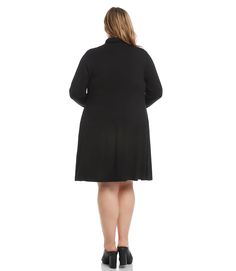 With its soft jersey-knit fabric and versatile a-line silhouette, this long sleeve turtleneck dress is a layering essential for the cooler temperatures ahead. It also features handy side pockets. Long sleeve Length: 40 3/4 inches (size 2X) 91% Rayon 9% Spandex Available in black Made in Los Angeles, USA Dry clean or hand wash cold Turtleneck Side seam pockets Model Height: 5 feet 10 inches Model is wearing a size 0X. Black Dress Style, Plus Size Black Dresses, Long Sleeve Turtleneck Dress, Turtleneck Dress, Los Angeles Usa, Plus Size Black, Trendy Plus Size Clothing, Long Sleeve Turtleneck, Turtle Neck Dress